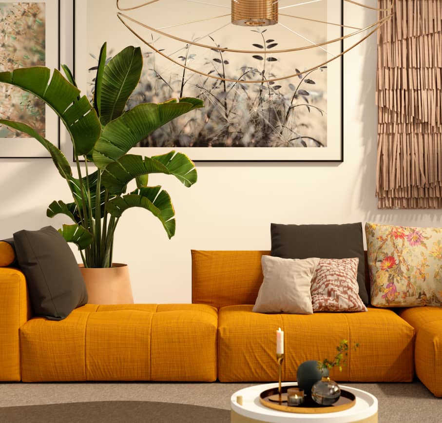 Stylish living room with orange modular sofa, indoor plants, and modern decor